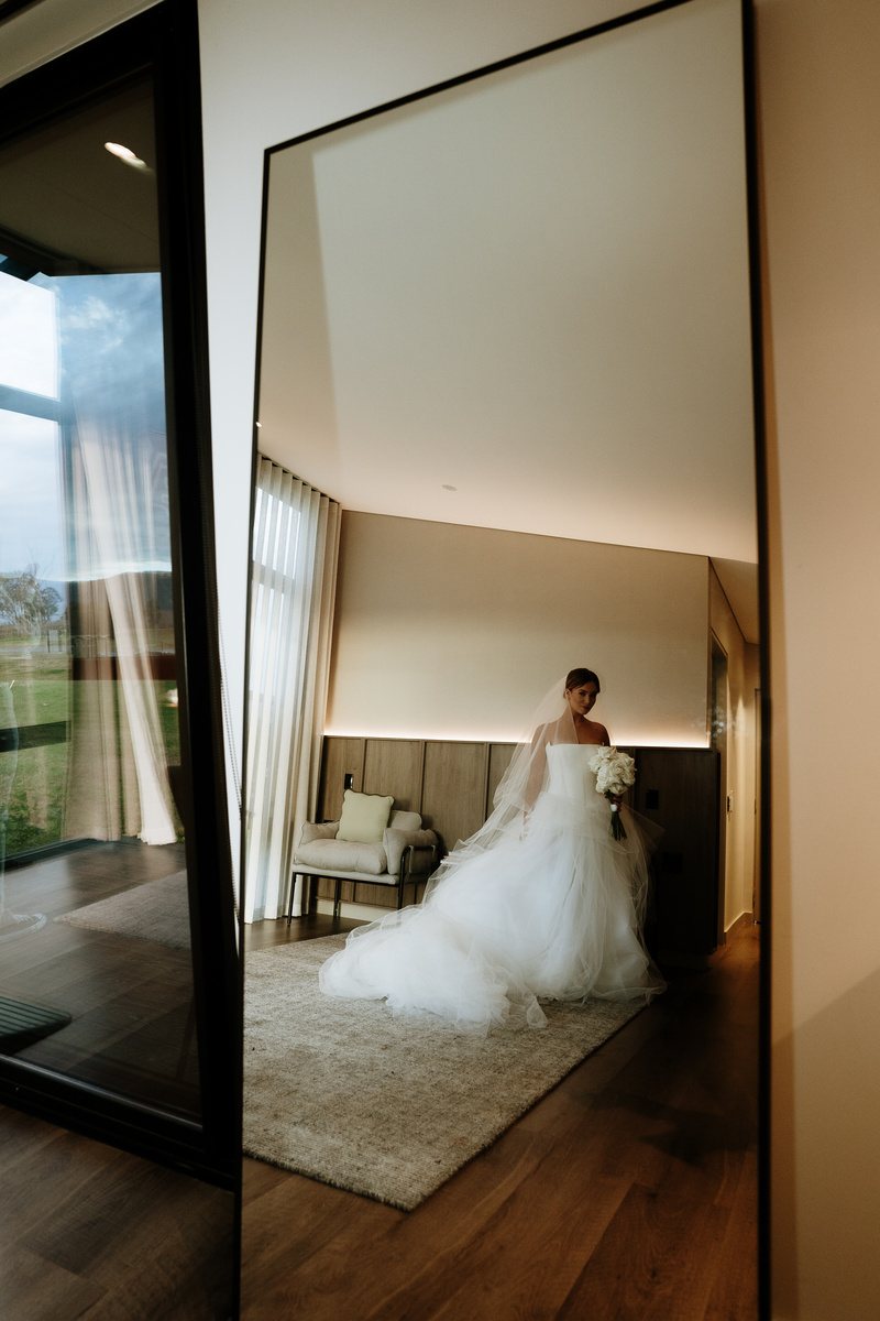 A bride in her gown in a Lane Retreat studio